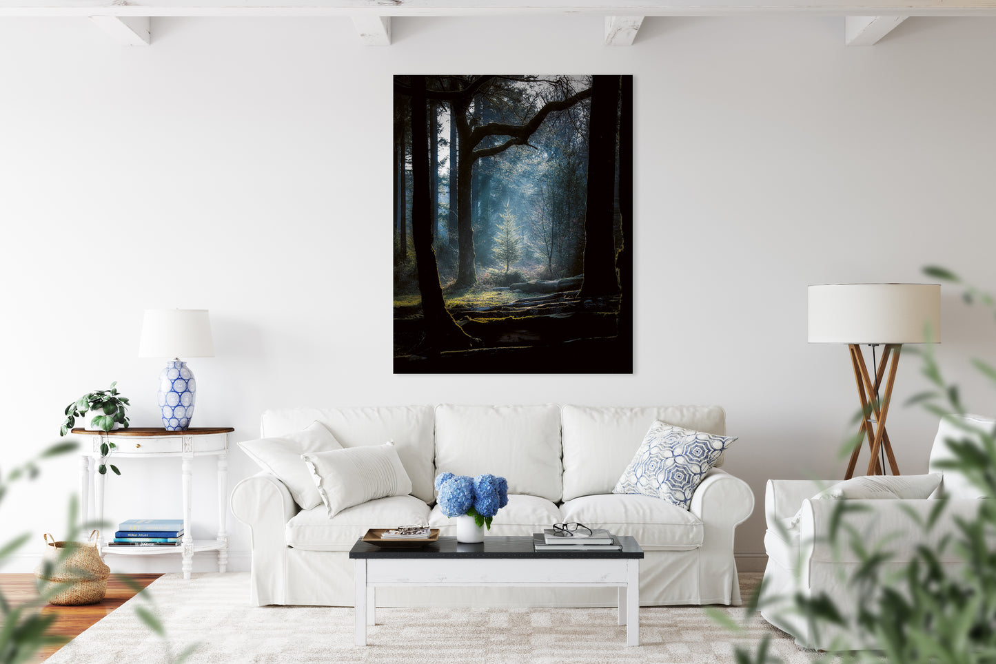 print of tree in a forest on a wall in a light room